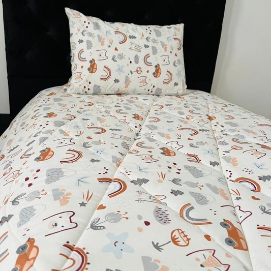 Couvre-lit Enfant “Rêve Arc-en-ciel” – Douceur et Fantaisie